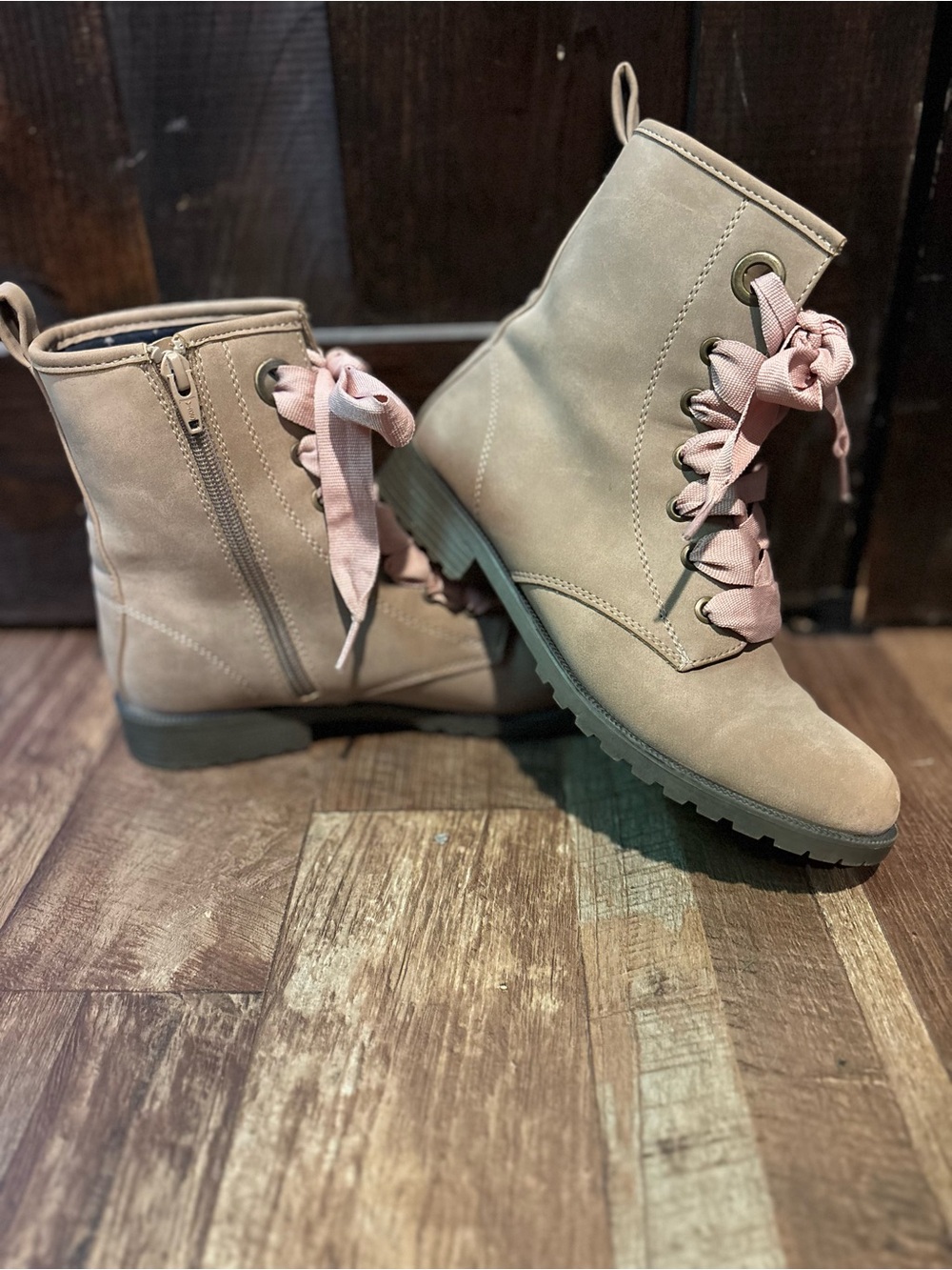 Tans boots with rose pink laces